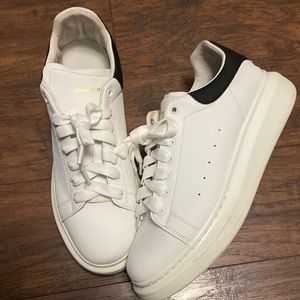 Men’s white and black size US 10.5 Euro 44 Alexander McQueen shoes